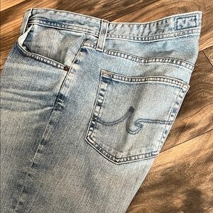 Light Blue Straight Fit Denim Jeans with Vintage Distressed Look